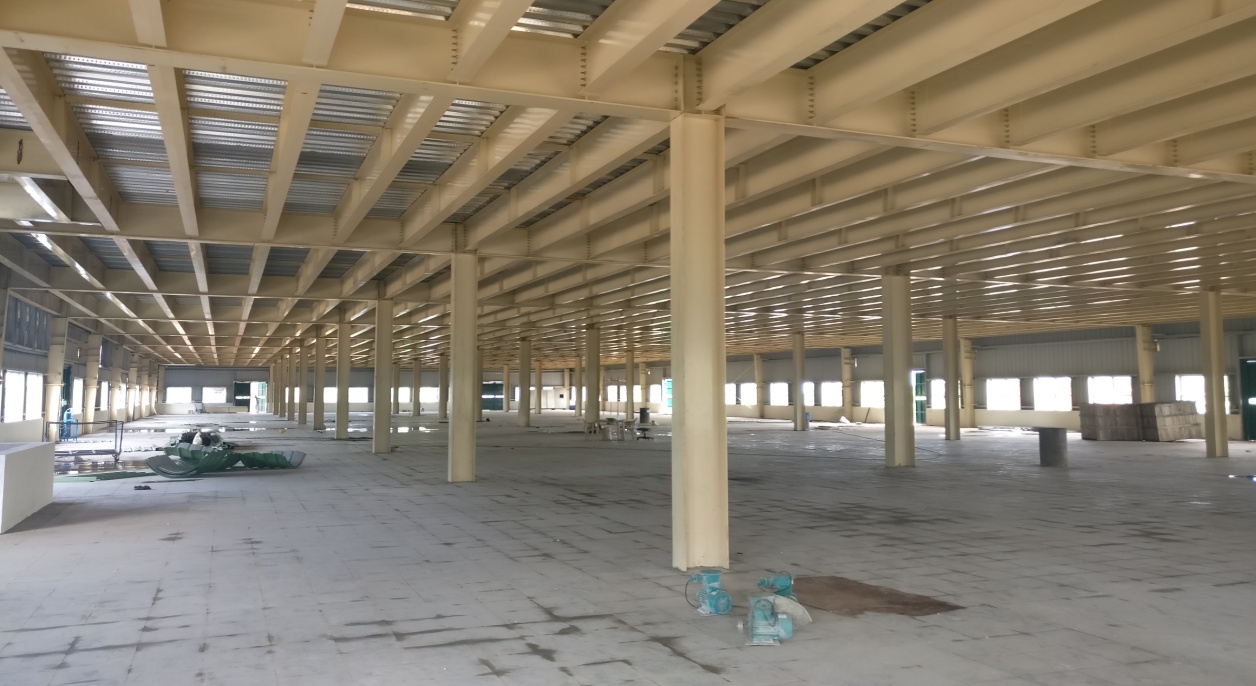 Warehouse interior with structural beams and columns